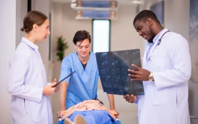 Medical team reviewing an X-ray of a patient in a hospital room