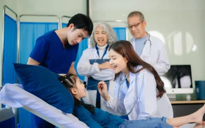 Doctors and nurses discussing medical data and treatment plans in the hospital